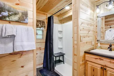 a bathroom with a shower and a sink at Idyllic Cabin in the Heart of Hocking Hills in Rockbridge