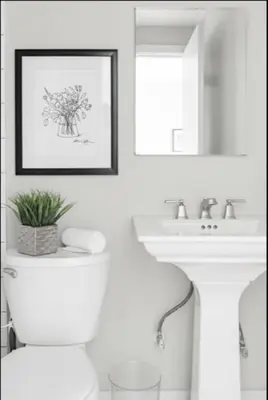 a bathroom with a white toilet and a sink at CUTE & COZY/TQL stadium/ Findlay Market/Brewery in Cincinnati