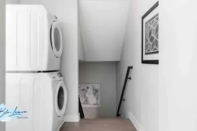 a laundry room with a washer and a dryer at This property is unlisted in Cincinnati