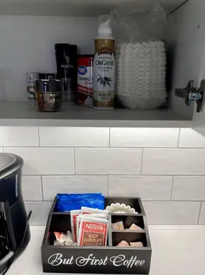 a box of food sitting on a kitchen shelf at This property is unlisted in Cincinnati
