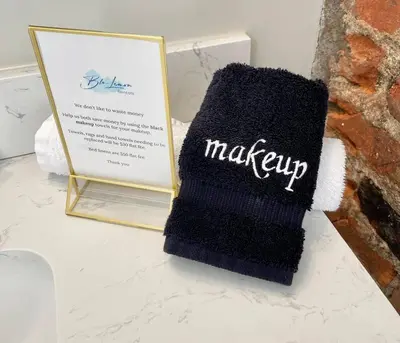 a black sock with the word makeup next to a sign at Modern/ parking/Eden Park/near Downtown/ FCC in Cincinnati