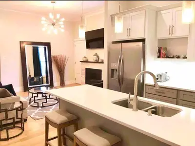 a kitchen with a sink and a counter top at Modern/ parking/Eden Park/near Downtown/ FCC in Cincinnati