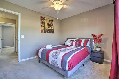 a bedroom with a bed and a ceiling fan at Spacious Delaware Abode with Private Backyard! in Delaware