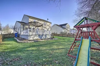 an empty playground in front of a house at Spacious Delaware Abode with Private Backyard! in Delaware