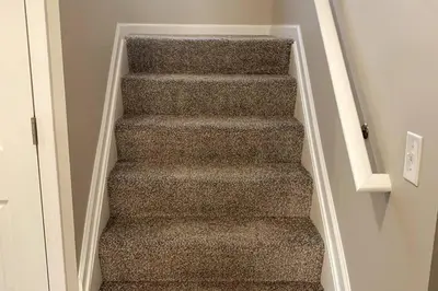 a staircase in a house with a stair case at 3311 Evanston Large Renovated 4 BDR Close to DTWN Laundry in Cincinnati