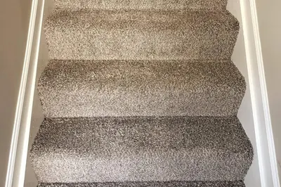 a spiralling stairway in a room with at 3311 Evanston Large Renovated 4 BDR Close to DTWN Laundry in Cincinnati