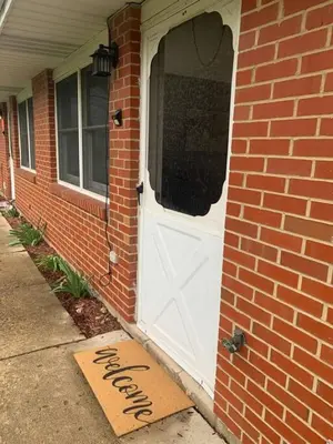 a door with a welcome mat in front of a brick house at 5145 Porsche Newly Remodeled 2 BDRM Ranch Attached Home in Rockdale