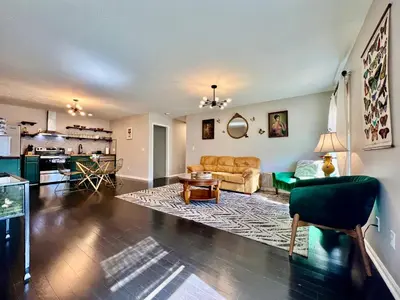 a living room with a couch and a table at 190 Overbrook Drive Swanky Swangos Dream Home by Jess in Monroe