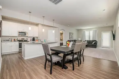a kitchen and dining room with a table and chairs at 950 Southline Newly Built Home in Lebanon 4 BDR 2 5 Bath in Lebanon