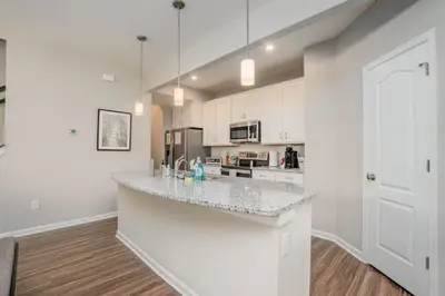 a kitchen with white cabinets and a counter top at 950 Southline Newly Built Home in Lebanon 4 BDR 2 5 Bath in Lebanon