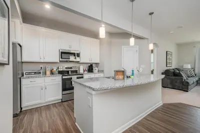 a kitchen with white cabinets and a counter top at 950 Southline Newly Built Home in Lebanon 4 BDR 2 5 Bath in Lebanon