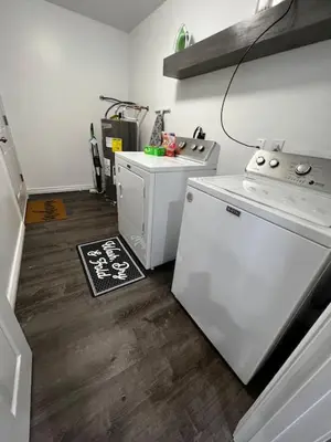 a kitchen with a stove and a white stove top oven at 956 Olympia Drive Brand New Mason Home with Luxurious Finishes in Mason
