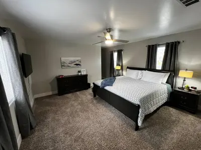 a bedroom with a bed and a ceiling fan at 956 Olympia Drive Brand New Mason Home with Luxurious Finishes in Mason