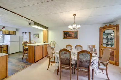 a kitchen and dining room with a table and chairs at Historic Alexandria Home with Private Yard! in Alexandria