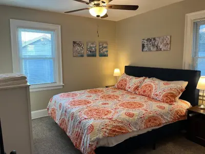 a bedroom with a bed and a ceiling fan at Hunter #1, Private One Bed near Xavier & Downtown in Bellevue