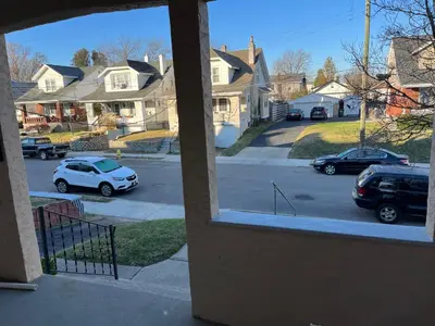 a view from a window of a street with parked cars at Hunter #1, Private One Bed near Xavier & Downtown in Bellevue