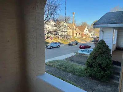 a view of a street from a window of a house at Hunter #1, Private One Bed near Xavier & Downtown in Bellevue