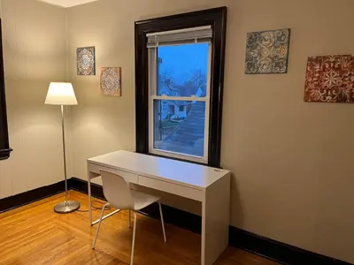 a white desk in a room with a window at Hunter #2 Private One Bed near Xavier & Downtown in Bellevue