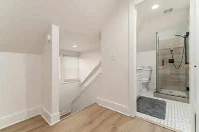 a bathroom with a shower and a toilet at Housepitality - The Madison House - Brand New in Columbus