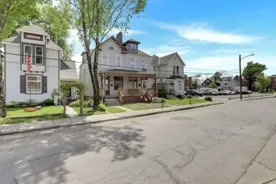 an empty street in front of a house at Housepitality - The Madison House - Brand New in Columbus