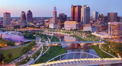 a city skyline with a bridge over a river at Housepitality - The Southern Orchards Cottage in Columbus