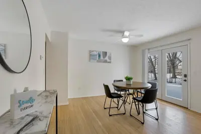 a dining room with a table and chairs at Housepitality - The Gahanna Hideaway in Gahanna