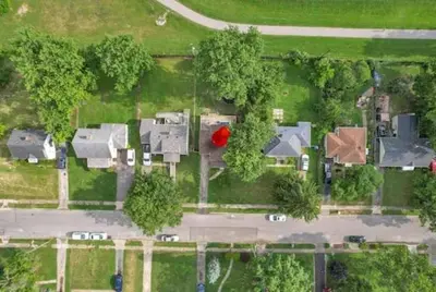 an aerial view of a house in a suburb at The Lucky 7's Inn-5 Beds in Columbus