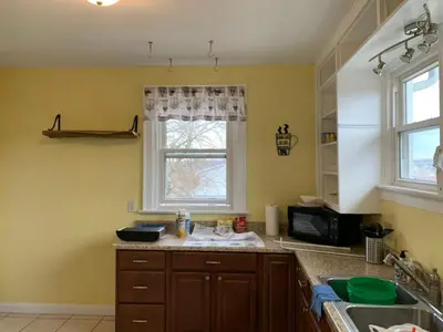 a kitchen with a sink and a window at A2 Executive City View apartment perfect for traveling professionals in Norwood