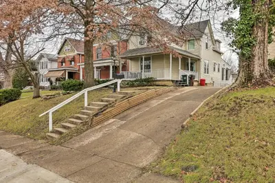 a street in a residential neighborhood with houses at Northern Kentucky Studio Near Cincinnati! in Southgate