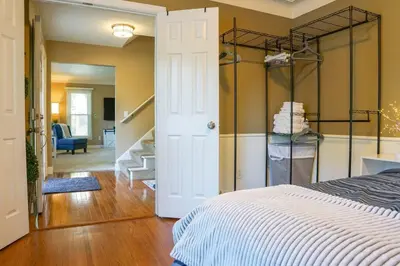 a bedroom with a bed and a walk in closet at 4BR/2.5BA Home boasting 2400sqft and Eat-in KTN in Toledo