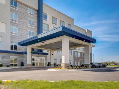 a hotel building with a blue roof at Hampton Inn & Suites Williamstown Ark Encounter, Ky in Williamstown
