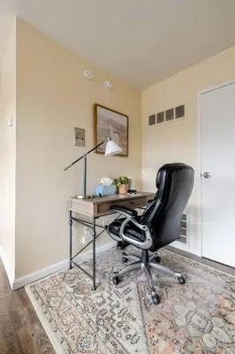 an office with a desk with a chair and a lamp at Georgetown Villas Nice Valley 3-4c & Creek Views! in Fairview Park