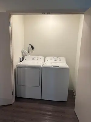 two whitewashes sitting next to each other in a room at THE NEST in Greenfield