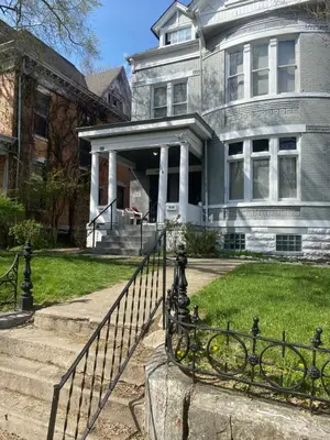 a house with a gate in front of it at Awesome Attic Studio Private Room 3A in Cincinnati