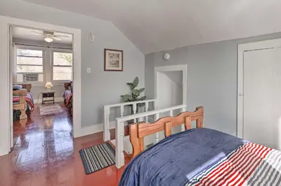 a bedroom with a bed in a room at Manchester Getaway on Ohio River Scenic Byway in Manchester