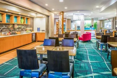 a restaurant with tables and chairs and a cafeteria at King's Inn Mason,Ohio in Cincinnati