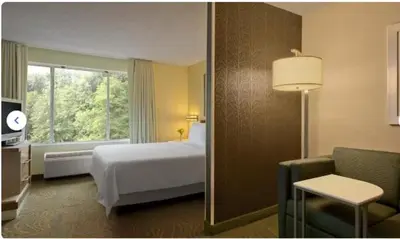a hotel room with a bed and a window at King's Inn Mason,Ohio in Cincinnati
