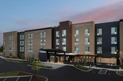 a rendering of the entrance to the embassy suites hotel at TownePlace Suites by Marriott Cincinnati Mason in Mason