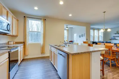 a kitchen with a sink and a counter top at Private Backyard! Spacious Home 25 Mi to Columbus in New Albany