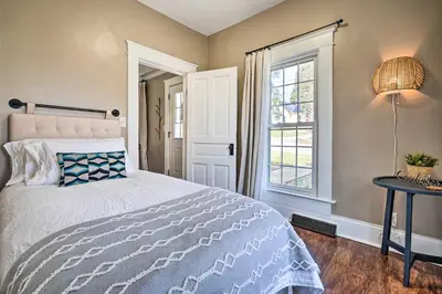 a bedroom with a bed and a window at Gambier Vacation Rental about 5 Mi to Mt Vernon! in Gambier