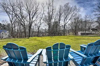 three blue chairs sitting in front of a field at Gambier Vacation Rental about 5 Mi to Mt Vernon! in Gambier
