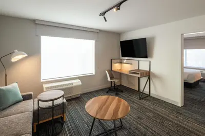 a living room with a couch and a table at TownePlace Suites by Marriott Georgetown in Georgetown