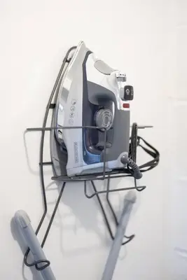 a camera sitting on a stand on a table at King & Queen Memory foam beds! 2-4c Georgetown Villas in Fairview Park