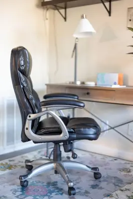 a office chair sitting in front of a desk at King & Queen Memory Foam Beds 2-2b Georgetown Villas in Fairview Park