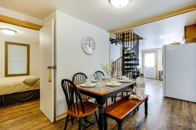 a dining room with a table and chairs at Lakeside Indiana Vacation Rental Near Fort Wayne! in Churubusco