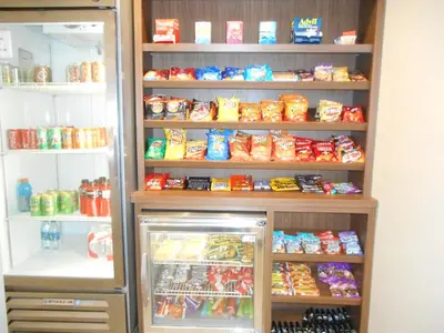a refrigerator filled with lots of different types of food at Holiday Inn Express Fairfield by IHG in Fairfield