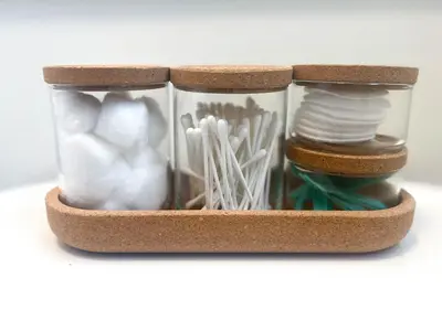 a glass jar filled with lots of white items on a shelf at The Cranbrook- Close to OSU-Downtown Columbus-Short North-Clintonville-Upper Arlington in Columbus