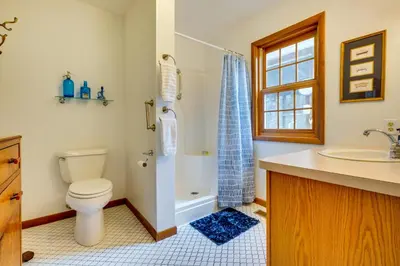 a bathroom with a toilet and a shower and a sink at Athens Vacation Rental - 6 Mi to Ohio University! in Athens